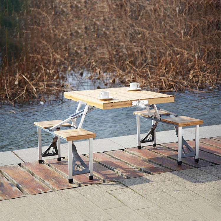 Mesa de picnic plegable con asientos